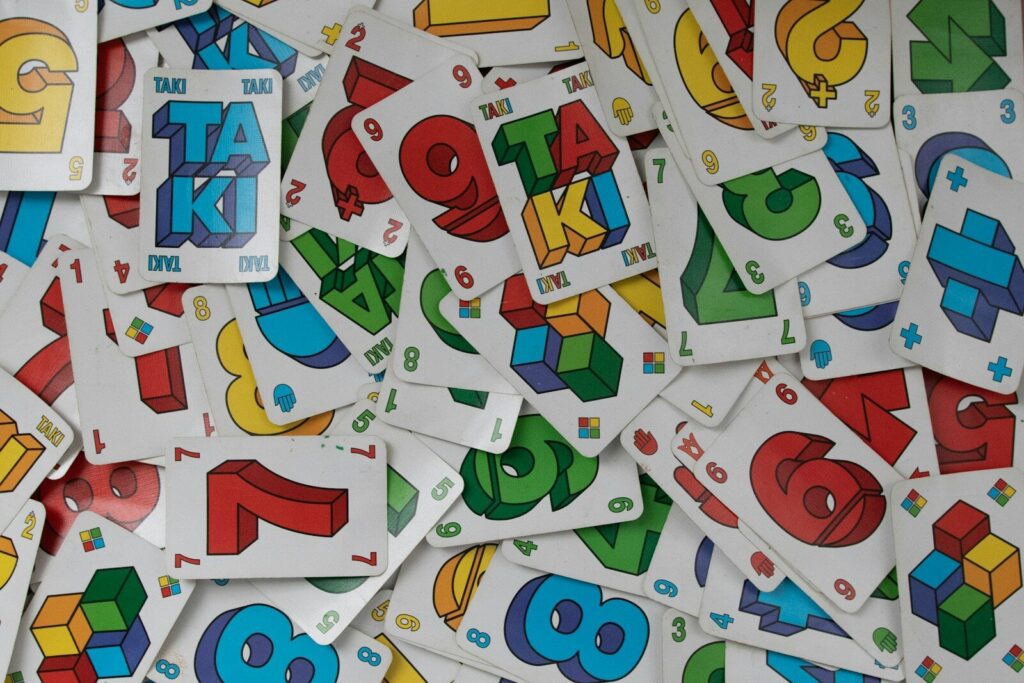 a pile of stickers with numbers and letters on them